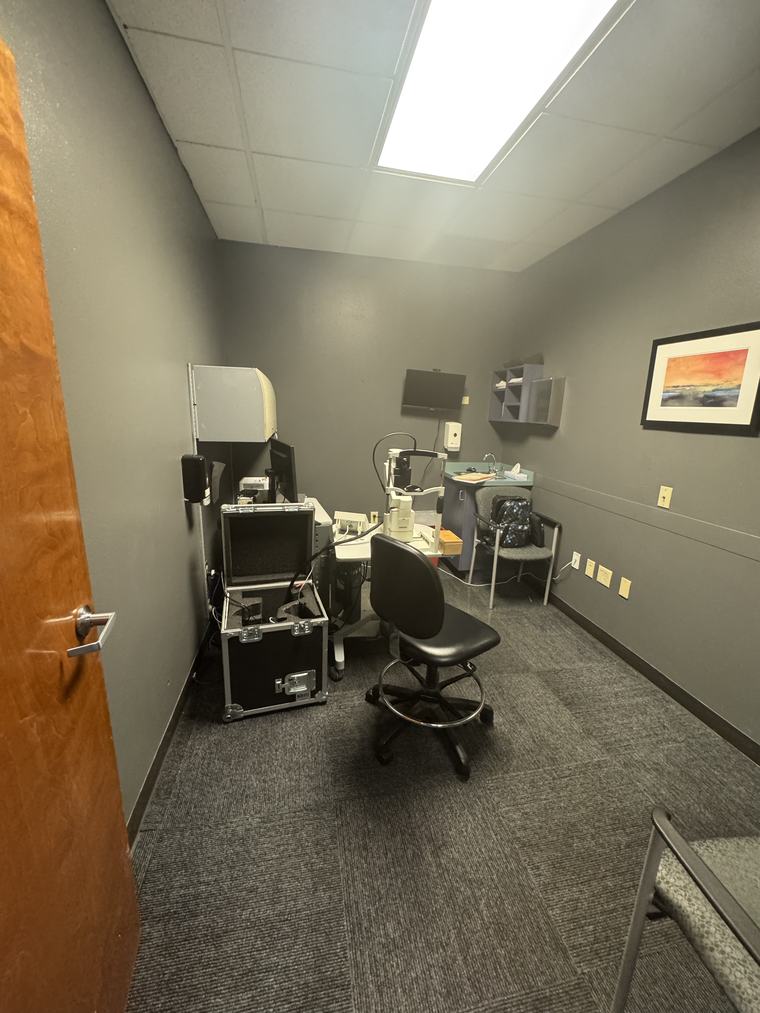 Exam room with advanced retinal imaging equipment at Healthy Vision Institute